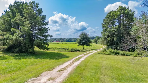 a view of a golf course with a swimming pool