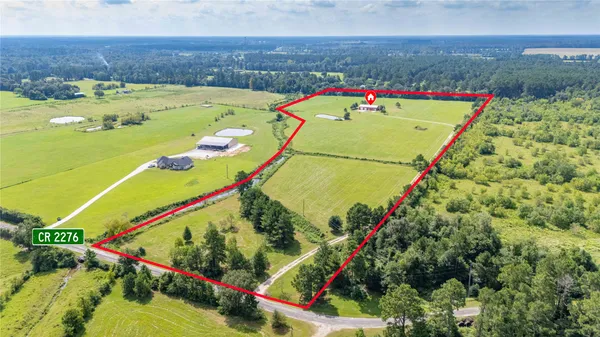 a view of a lake with a big yard