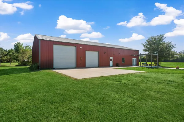 a view of a lake with a garden