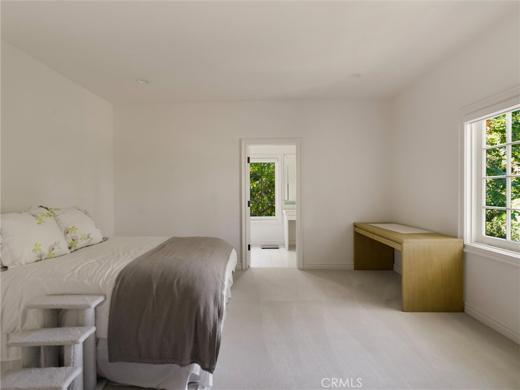 6000 Cavalleri Road Malibu, CA 90265 - Photo 36 of 44 a bedroom with a bed and a window