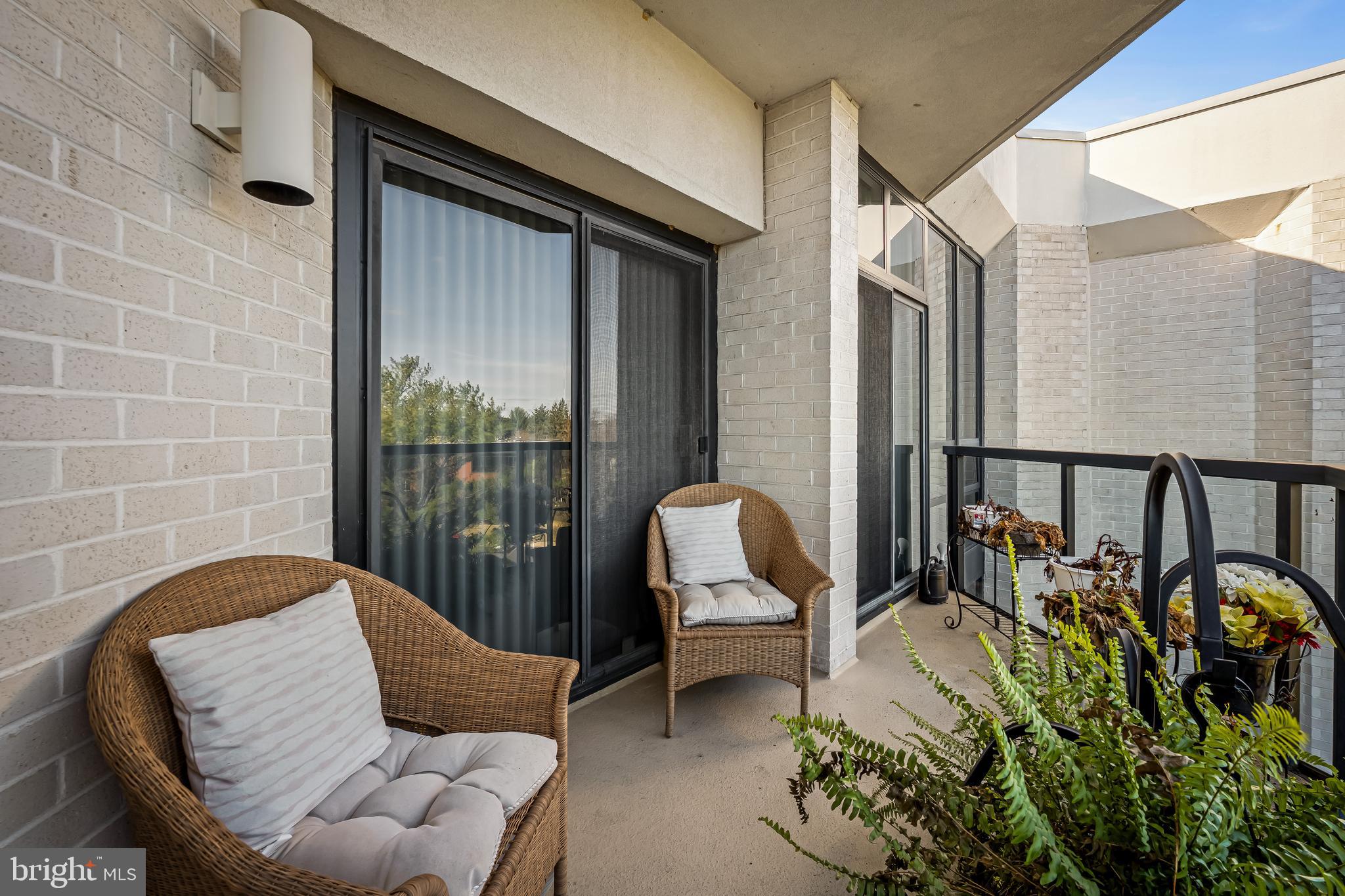4001 Old Court Road, Unit 509 Baltimore, MD 21208 - Photo 23 of 26 Balcony off Primary Bedroom and Bedroom 2