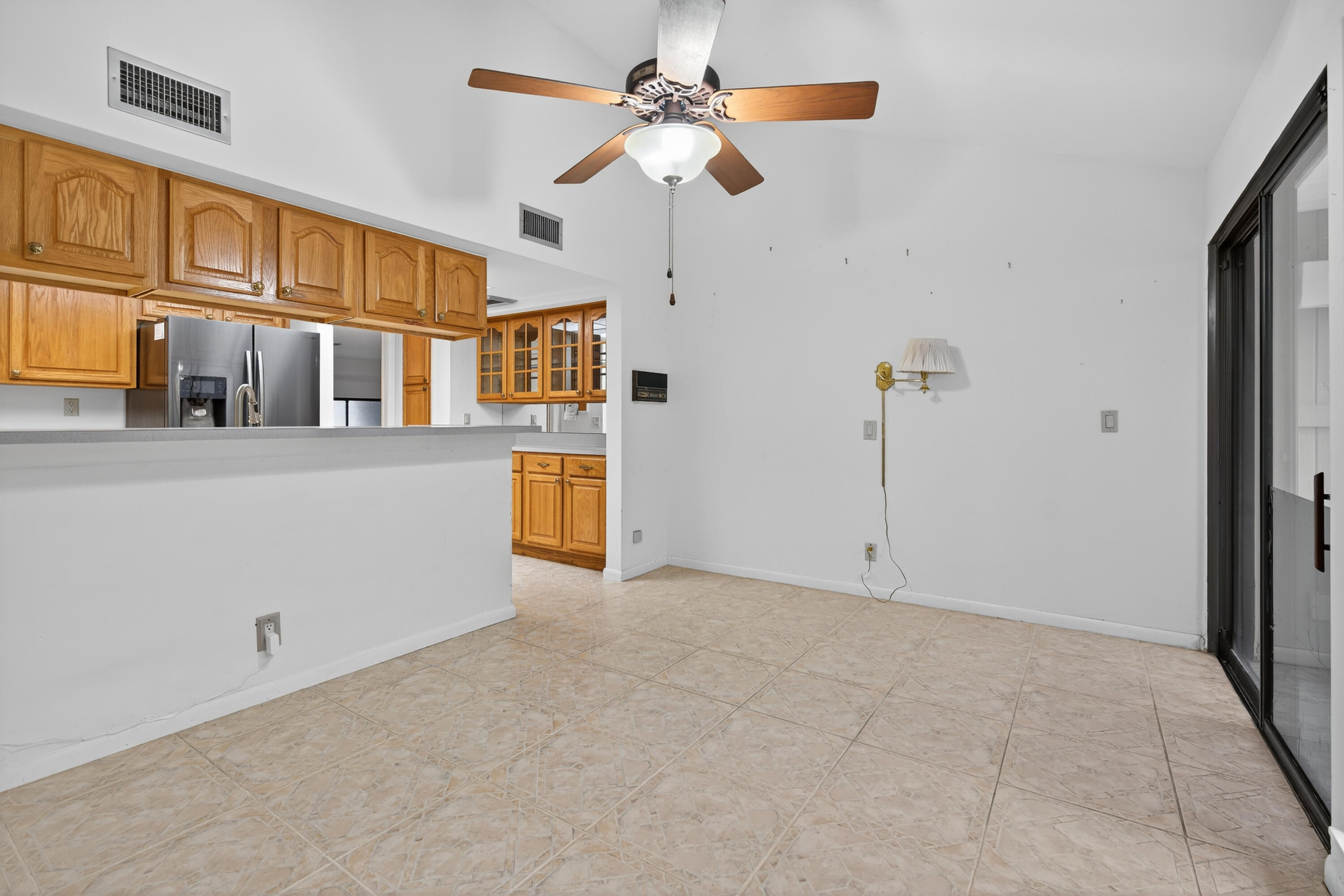 17145 Bay Street Jupiter, FL 33477 - Photo 12 of 43 a view of an empty room with a window