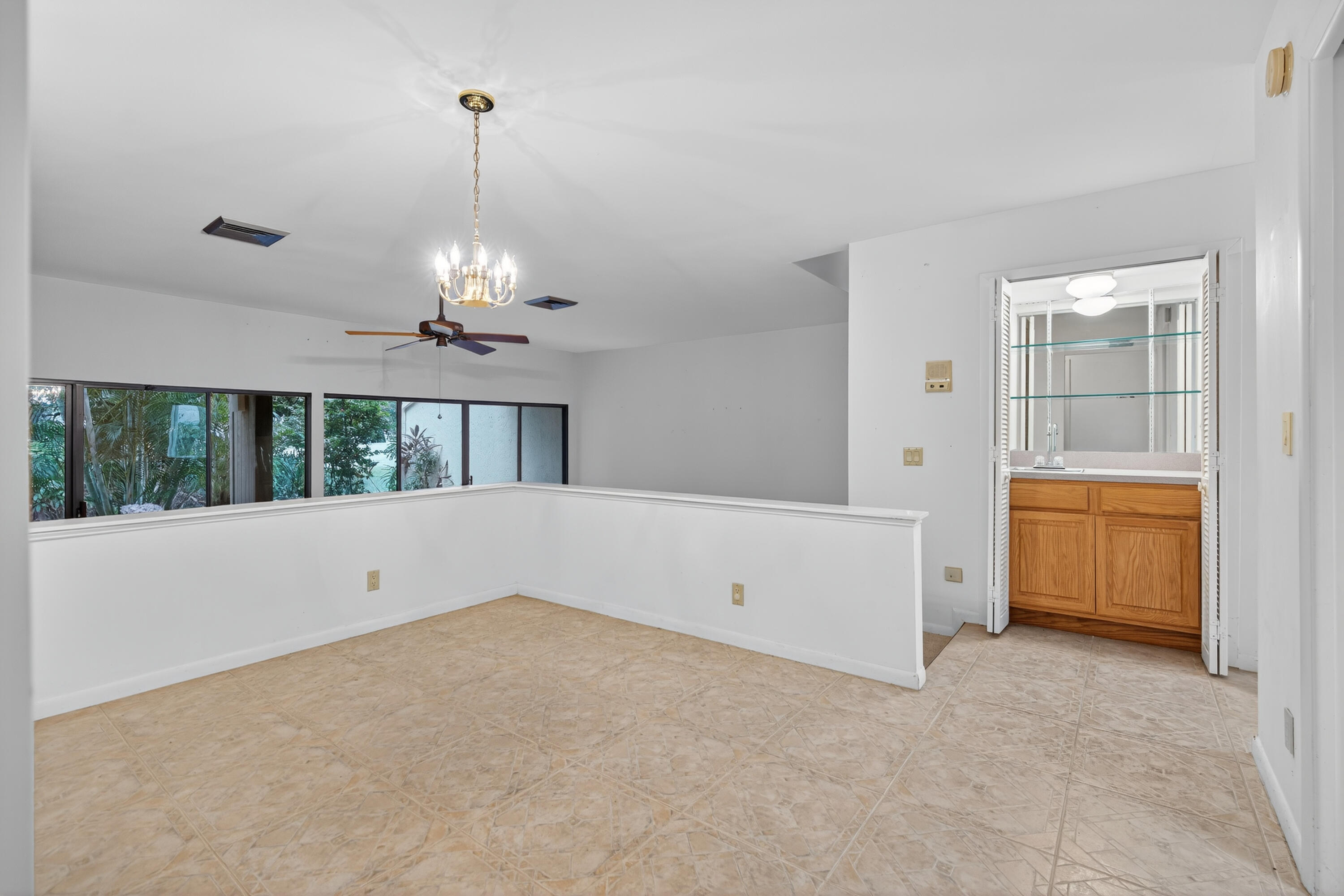 17145 Bay Street Jupiter, FL 33477 - Photo 15 of 43 a view of a room with an empty room