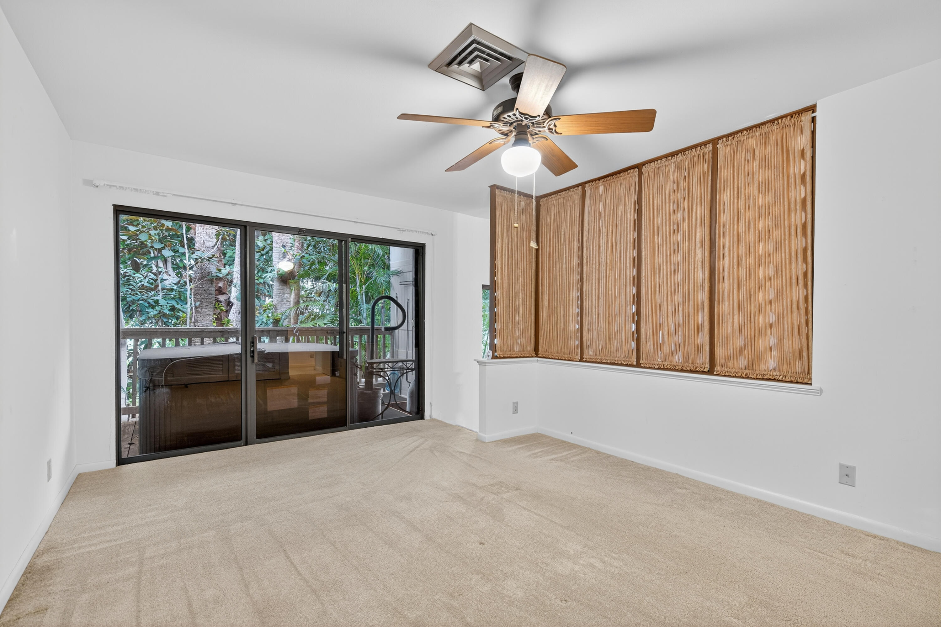17145 Bay Street Jupiter, FL 33477 - Photo 20 of 43 a view of an empty room with a window