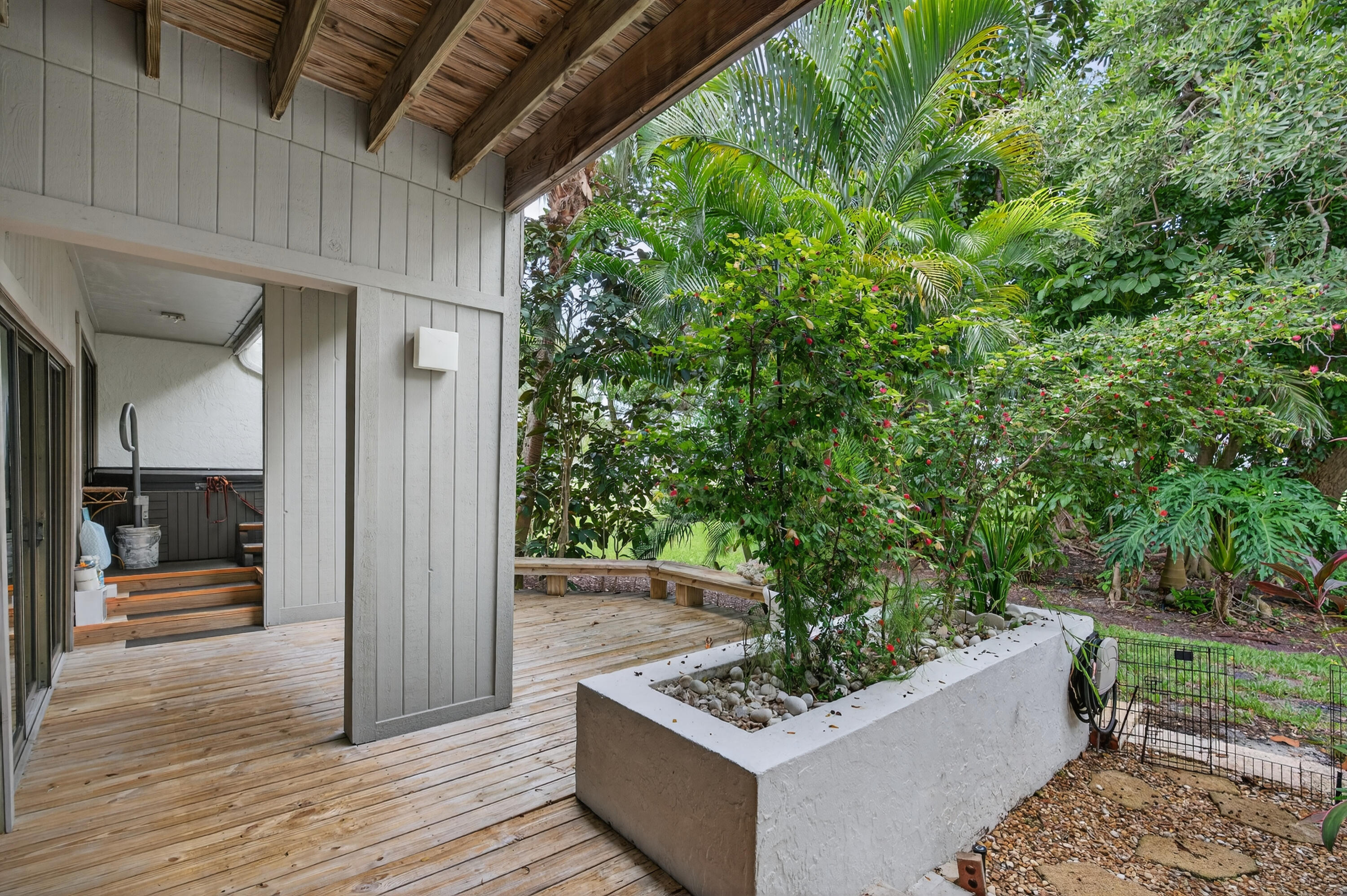 17145 Bay Street Jupiter, FL 33477 - Photo 22 of 43 a view of a entryway door of the house