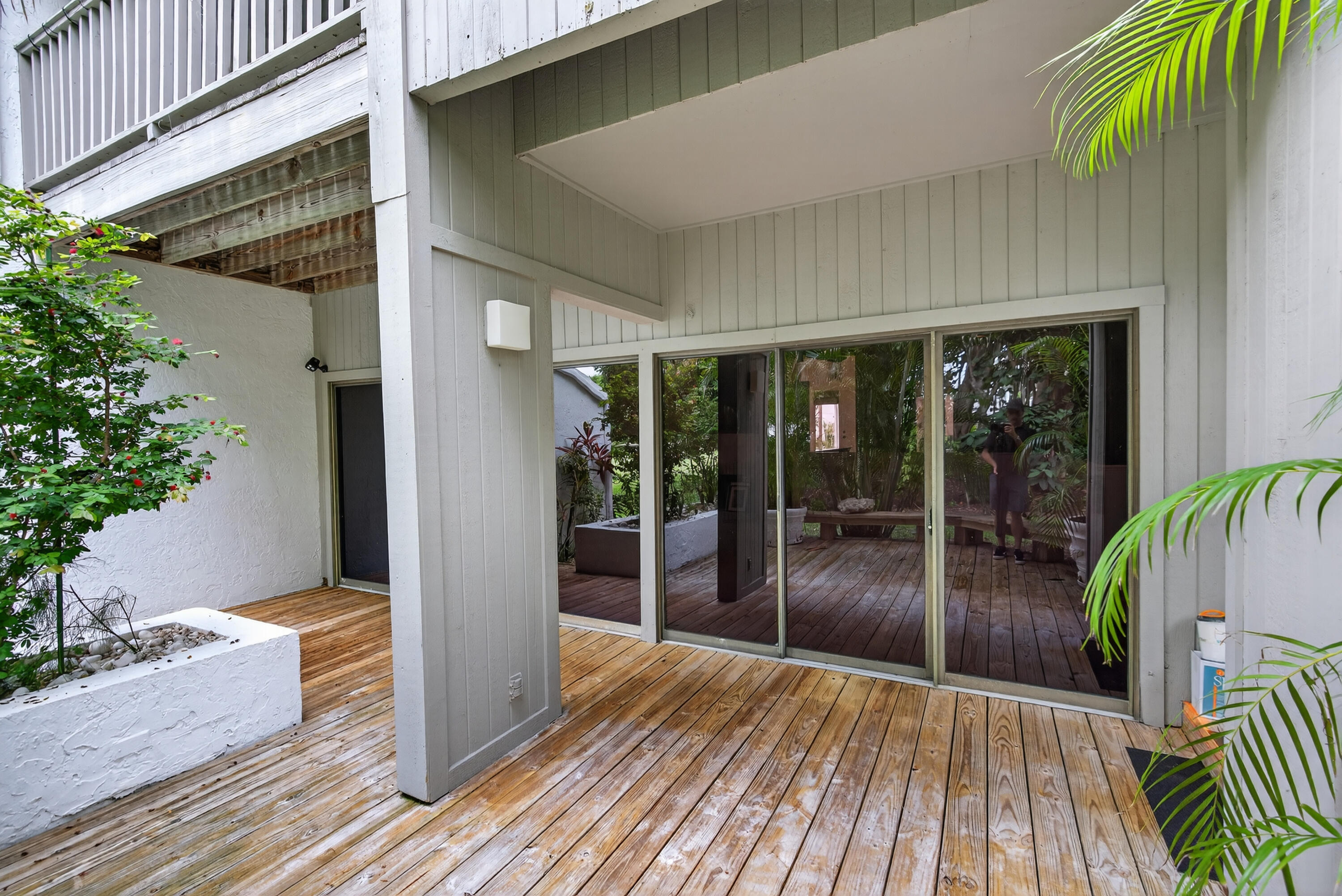 17145 Bay Street Jupiter, FL 33477 - Photo 26 of 43 a view of interior space with wooden floor and outdoor space