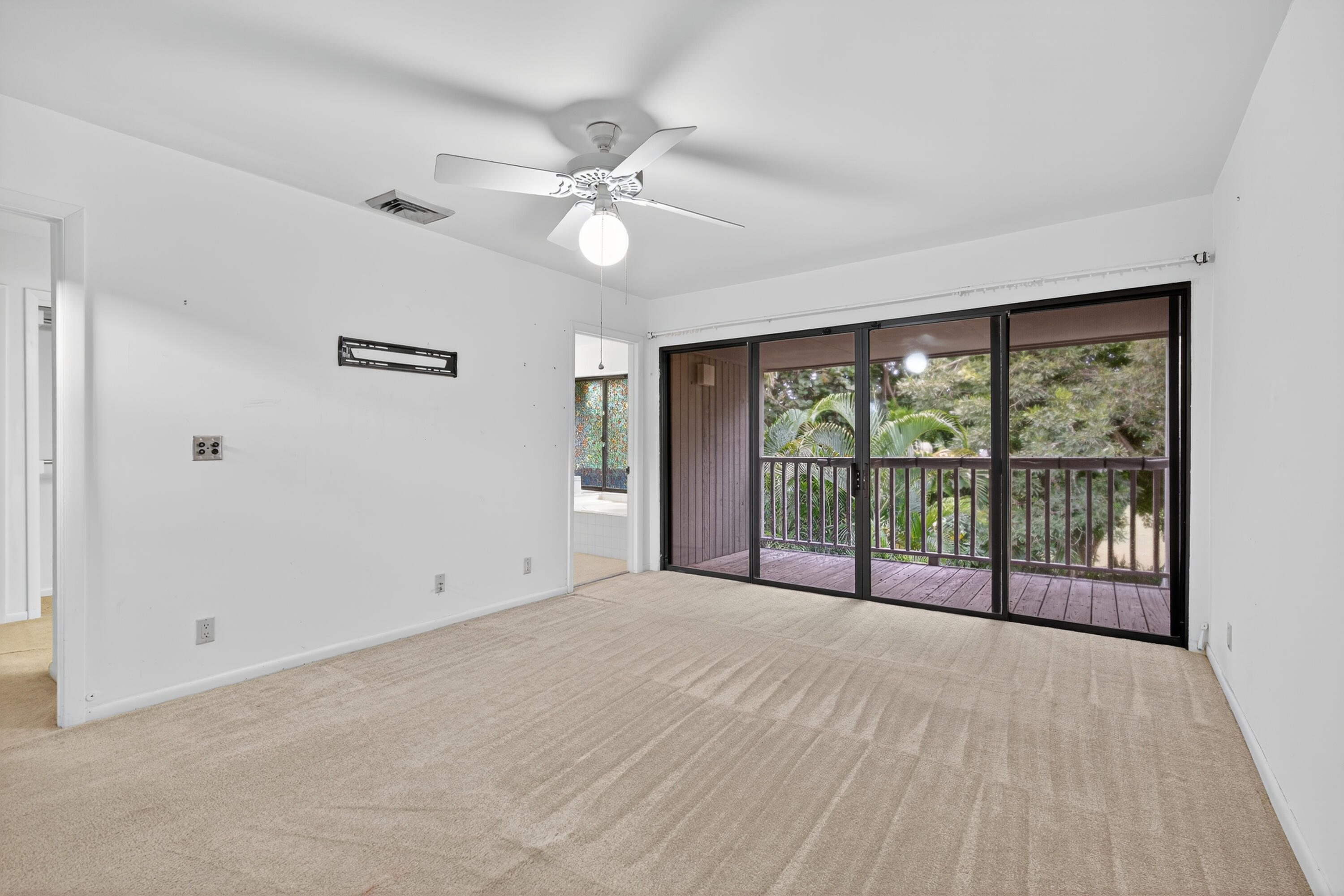 17145 Bay Street Jupiter, FL 33477 - Photo 29 of 43 a view of a room with a large window