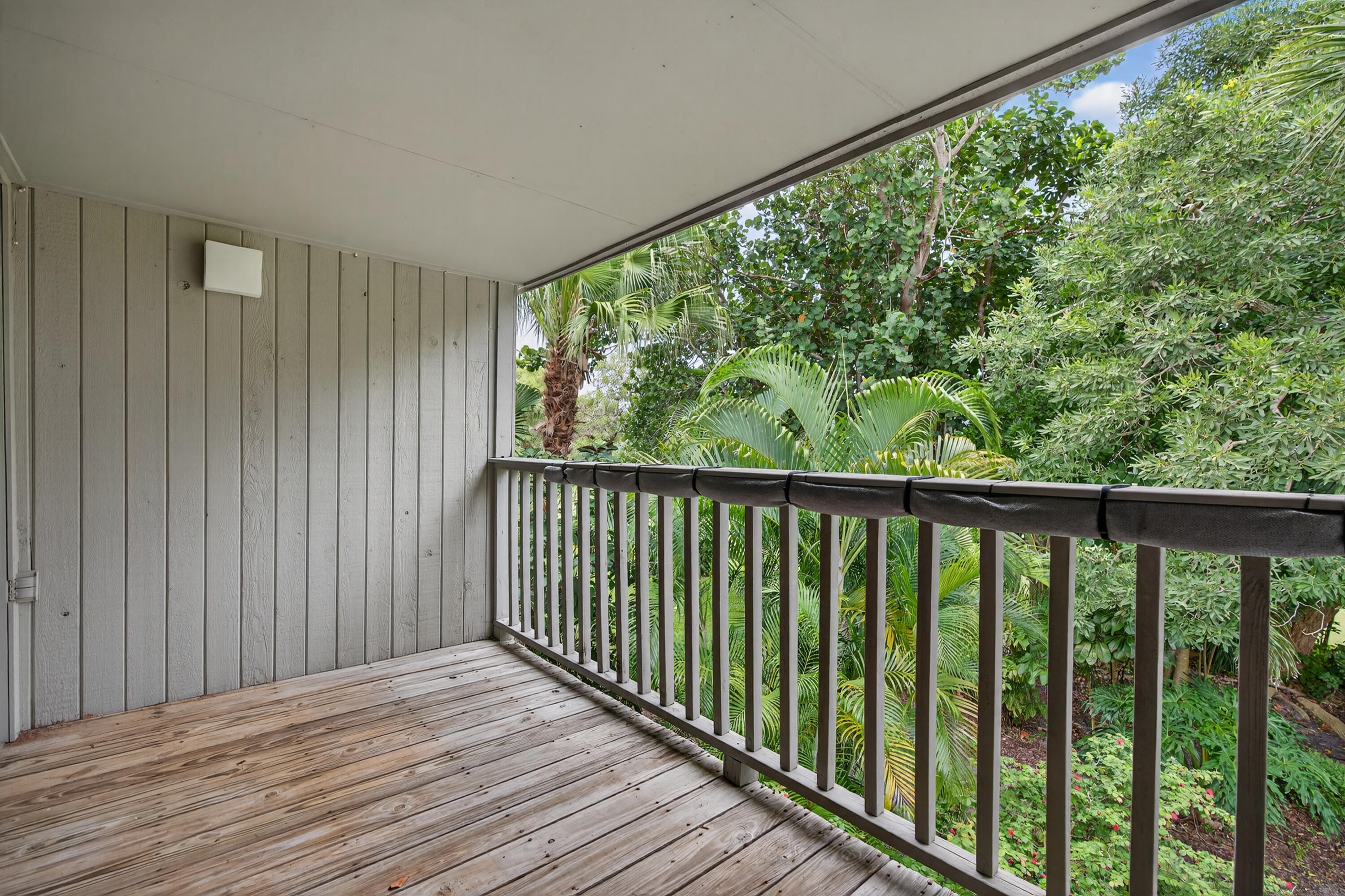 17145 Bay Street Jupiter, FL 33477 - Photo 31 of 43 a view of balcony with wooden floor