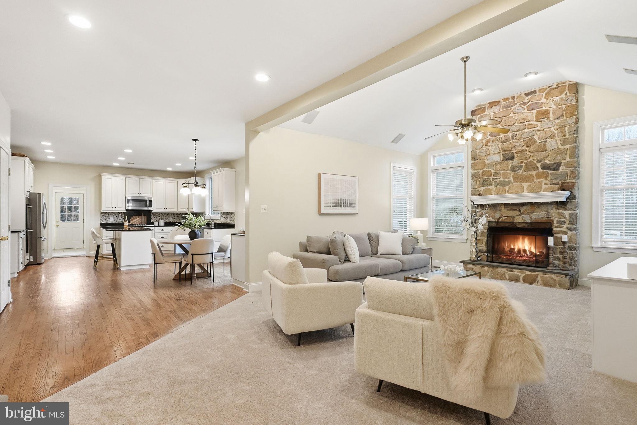 22 Springlea Lane Chester Springs, PA 19425 - Photo 12 of 80 a living room with furniture and a fireplace