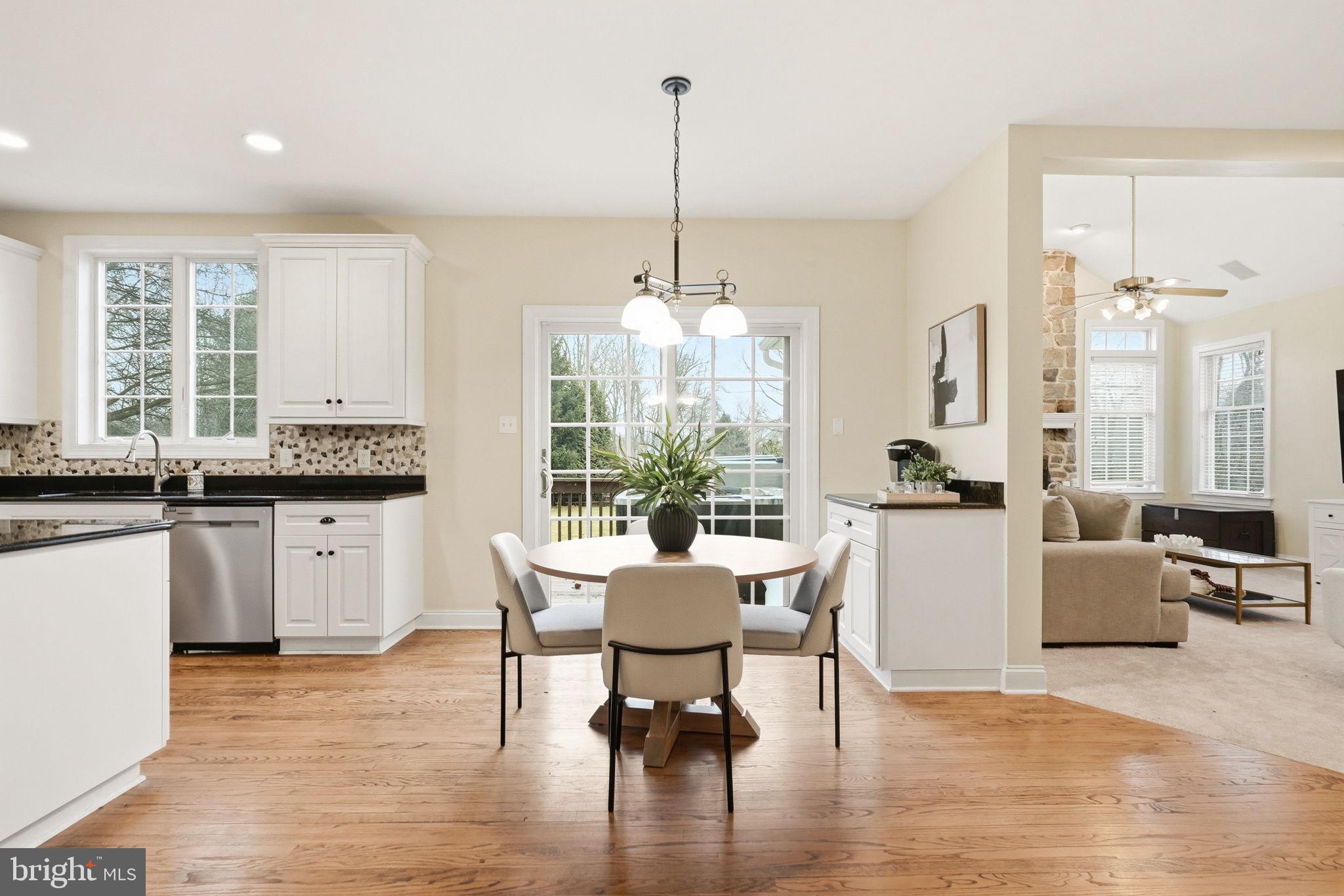 22 Springlea Lane Chester Springs, PA 19425 - Photo 15 of 80 a view of a dining room with furniture window and wooden floor