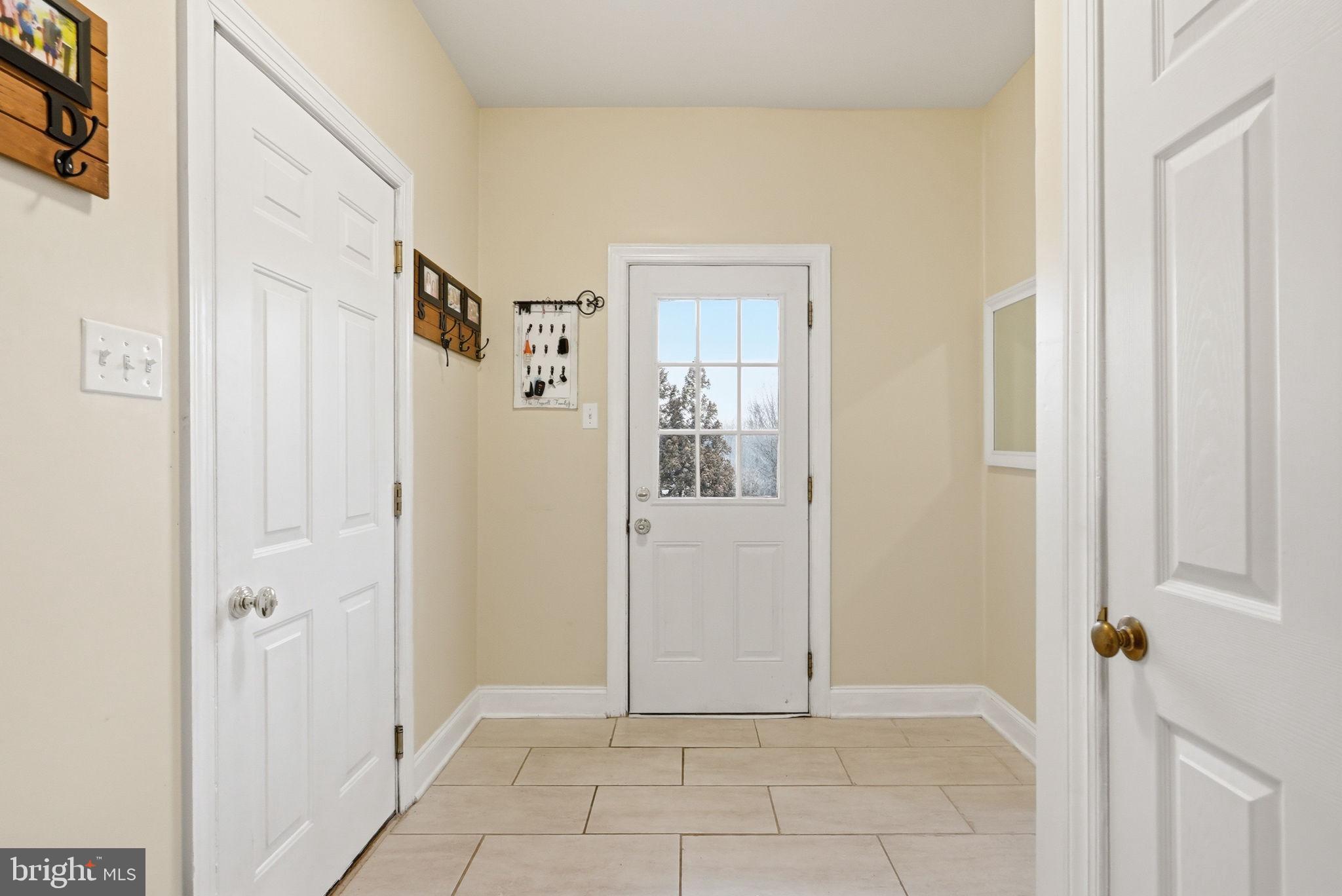 22 Springlea Lane Chester Springs, PA 19425 - Photo 34 of 80 a view of a hallway with wooden floor and closet area