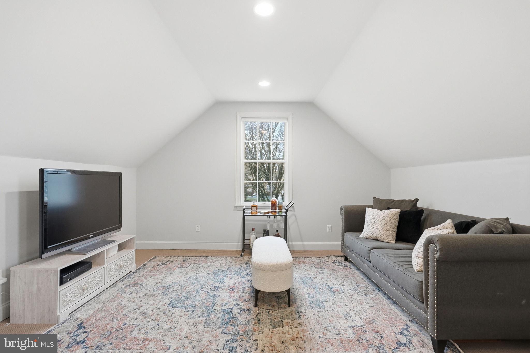 22 Springlea Lane Chester Springs, PA 19425 - Photo 43 of 80 a living room with furniture and a flat screen tv