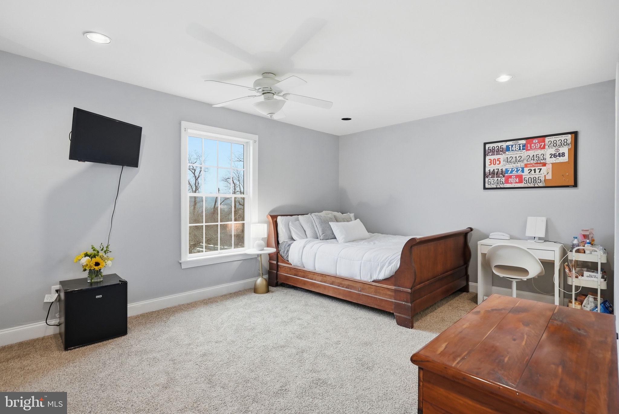 22 Springlea Lane Chester Springs, PA 19425 - Photo 60 of 80 a living room with furniture and a window