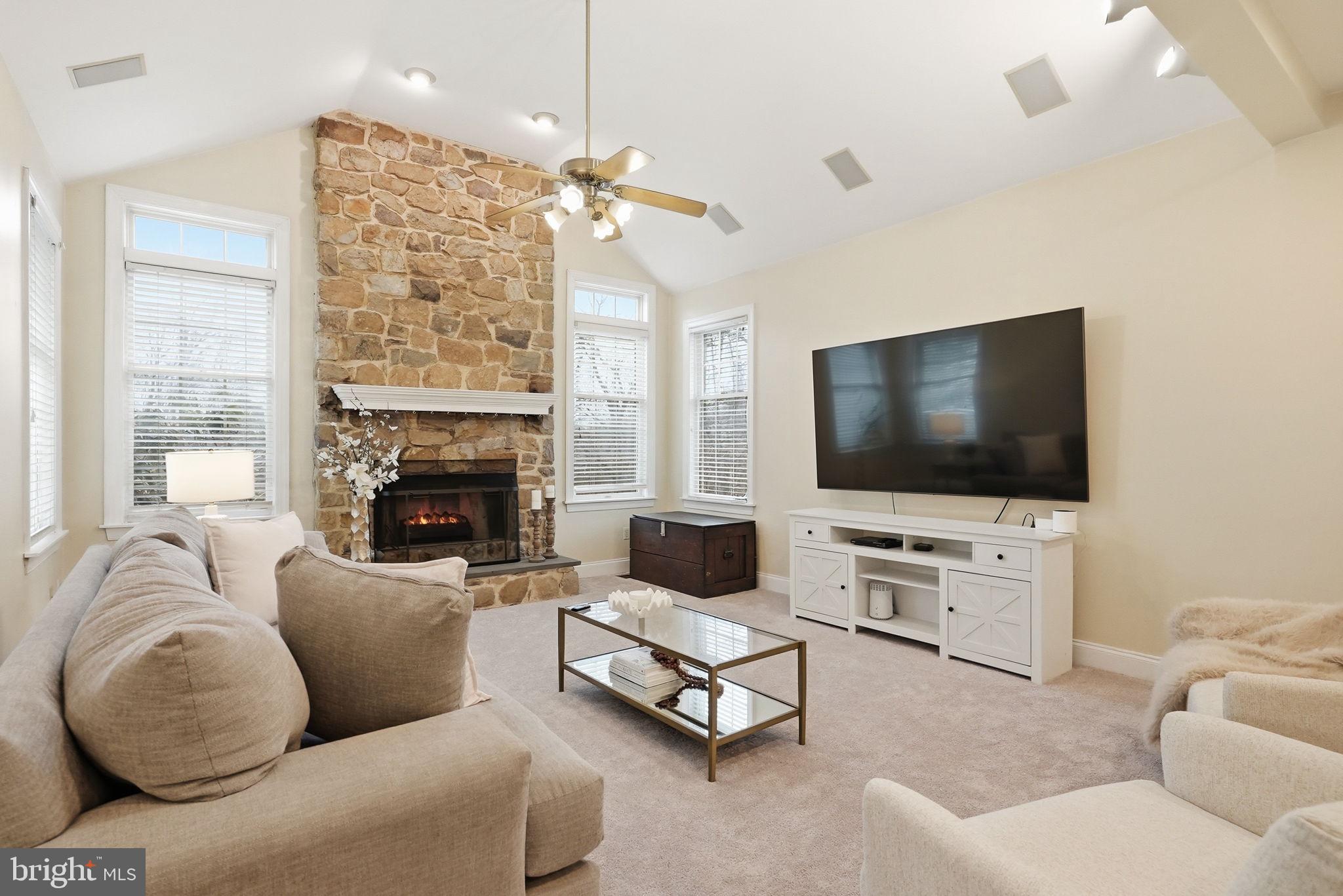22 Springlea Lane Chester Springs, PA 19425 - Photo 8 of 80 a living room with furniture and a flat screen tv