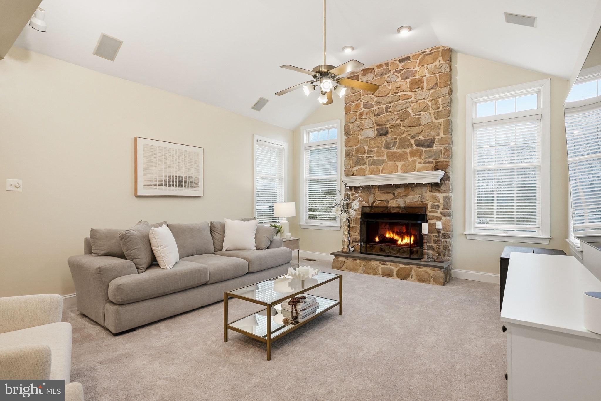 22 Springlea Lane Chester Springs, PA 19425 - Photo 9 of 80 a living room with furniture and a fireplace