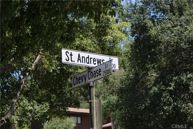 a street sign sitting on the side of a road