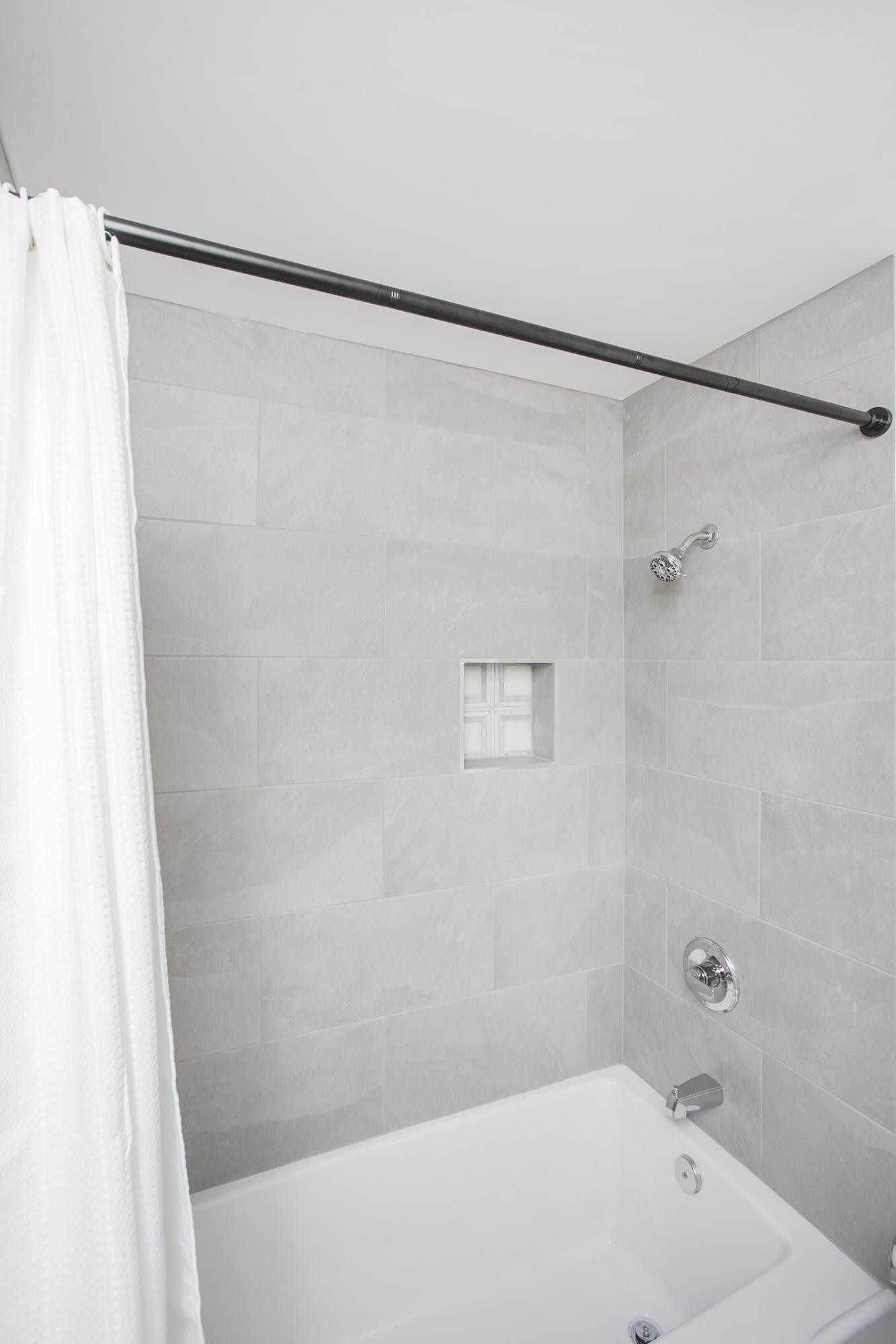 312 Summit Ridge Circle Nashville, TN 37215 - Photo 22 of 36 a bathroom with a shower and a bath tub