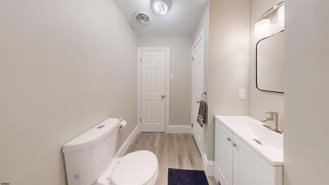 a bathroom with a sink and toilet