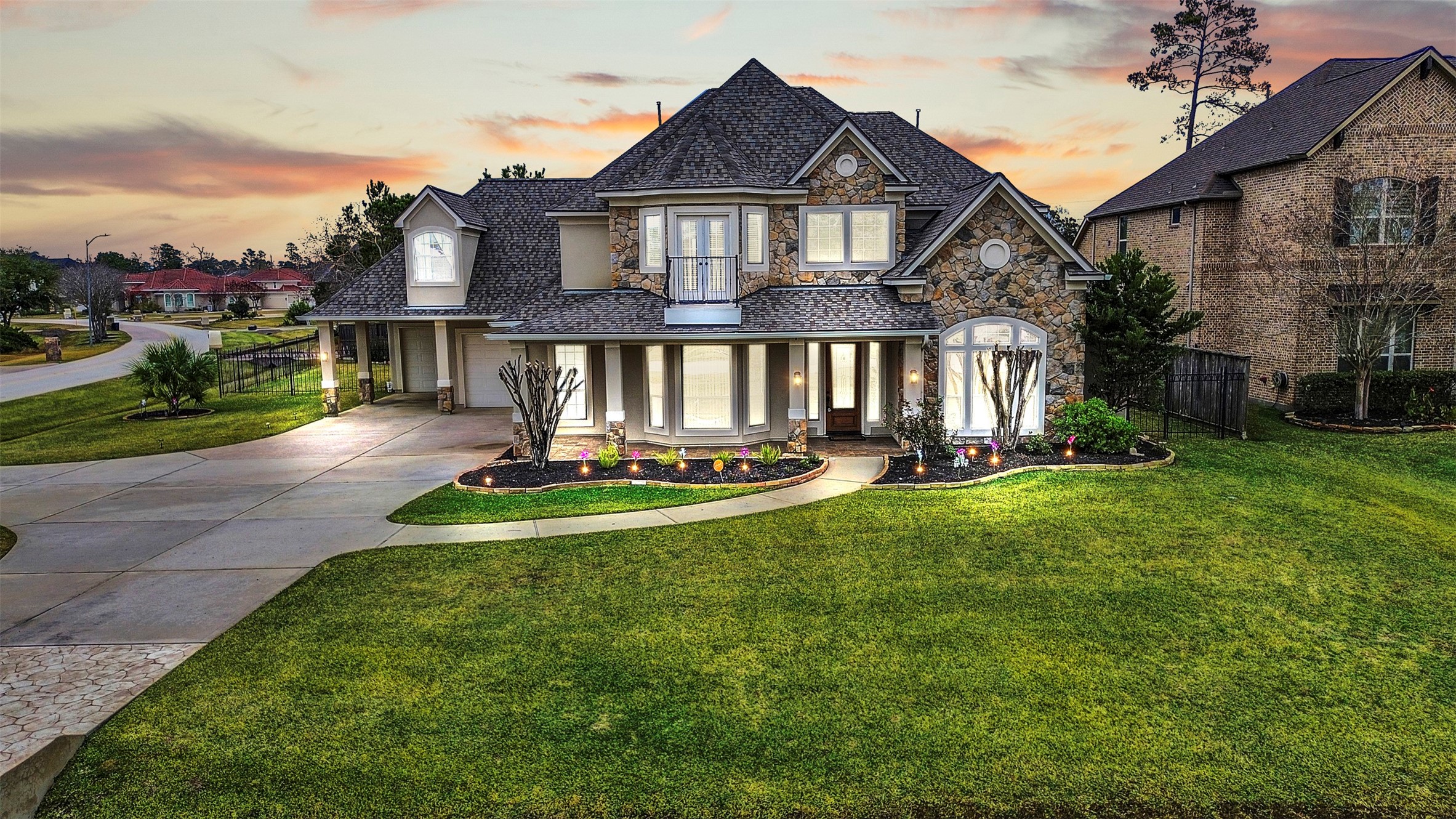 a front view of a house with a yard table and chairs