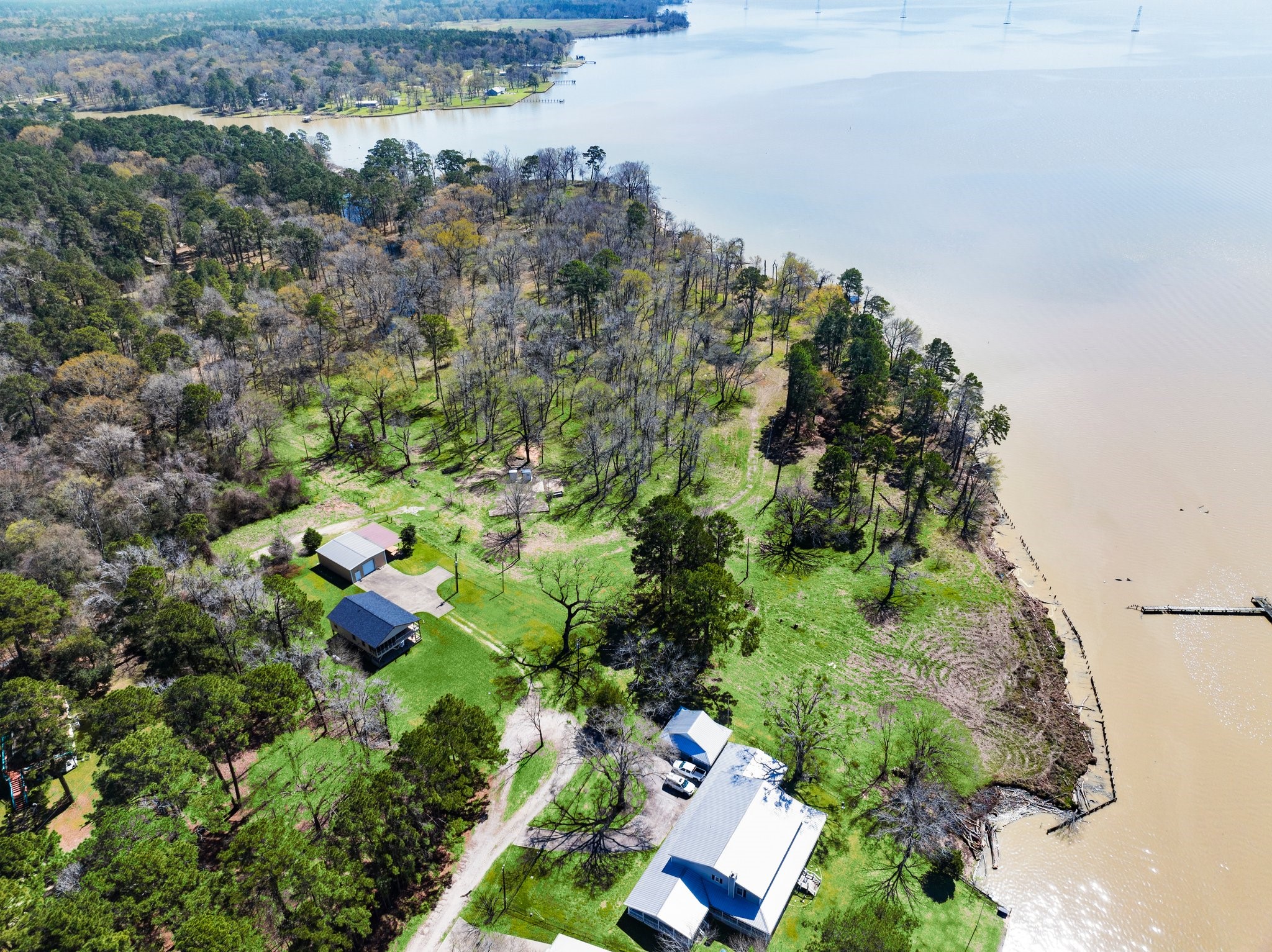 2405 Barrett's Landing Road Trinity, TX 75862 - Photo 12 of 48 a view of a lake with a yard