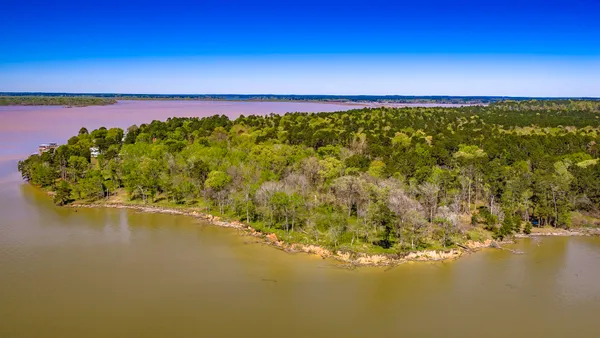 a view of a city with a lake view