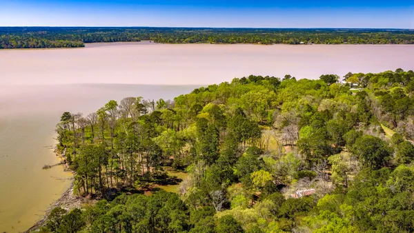 a view of a city with an ocean