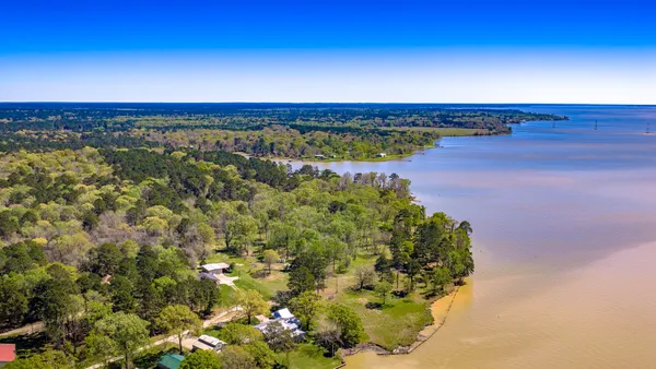 a view of a lake with a beach
