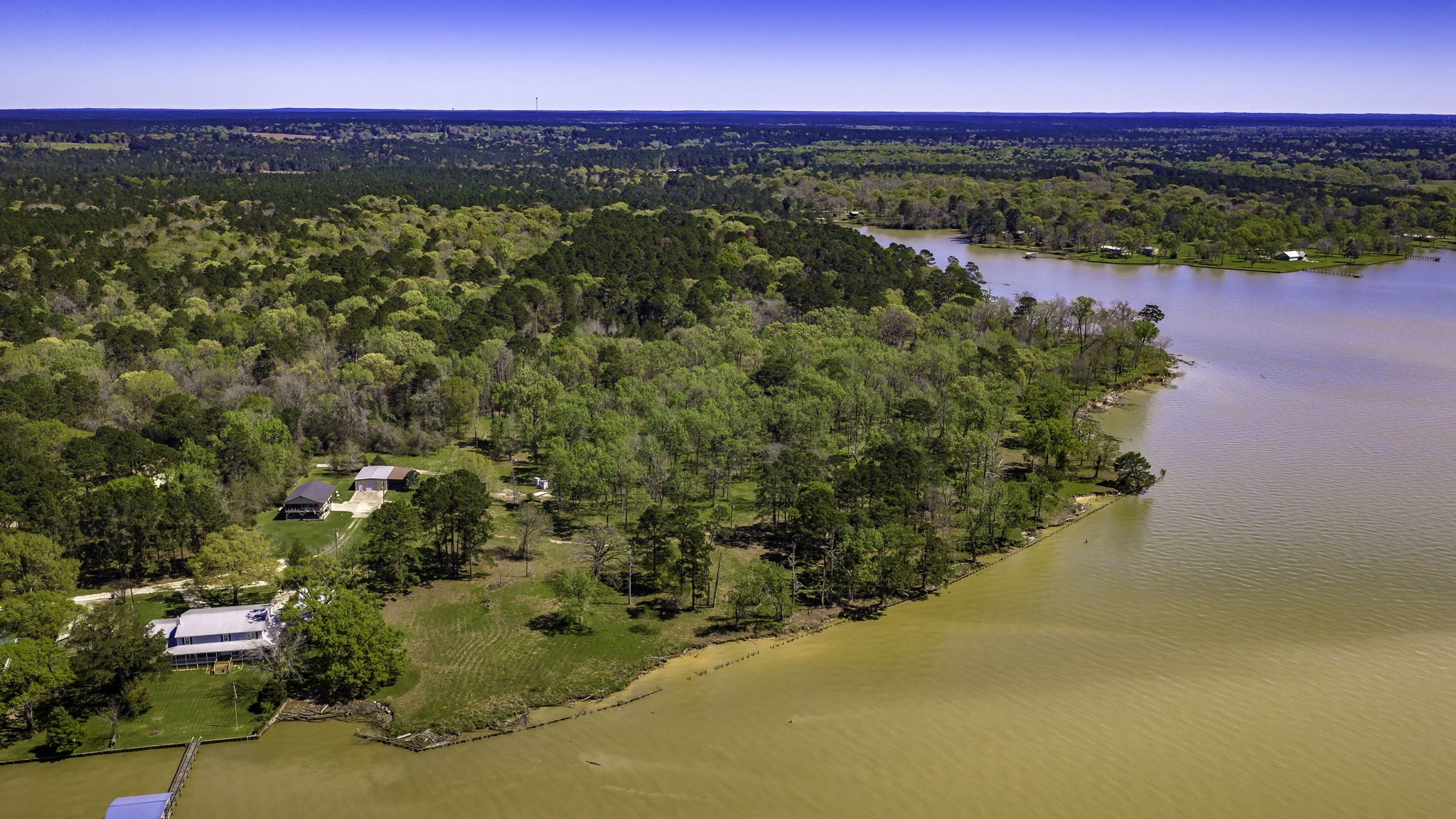 2405 Barrett's Landing Road Trinity, TX 75862 - Photo 23 of 30 a view of a yard with an ocean view