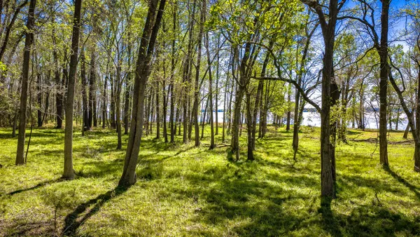 a view of swimming pool with an outdoor space and seating area