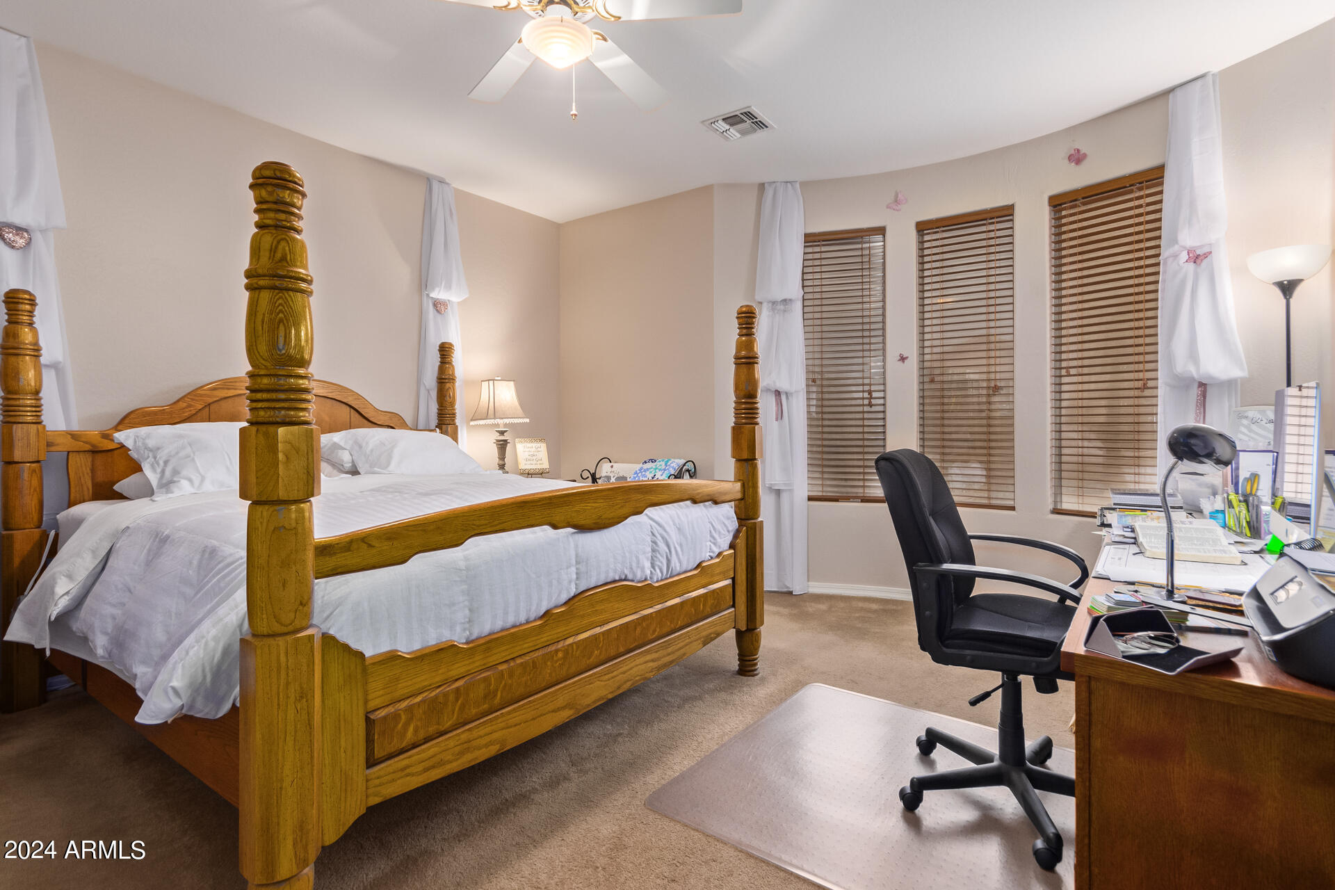 15224 West Redfield Road Surprise, AZ 85379 - Photo 15 of 28 a bedroom with a bed and a window