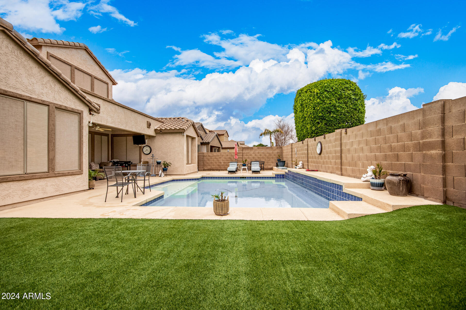 15224 West Redfield Road Surprise, AZ 85379 - Photo 27 of 28 a view of a backyard with sitting area