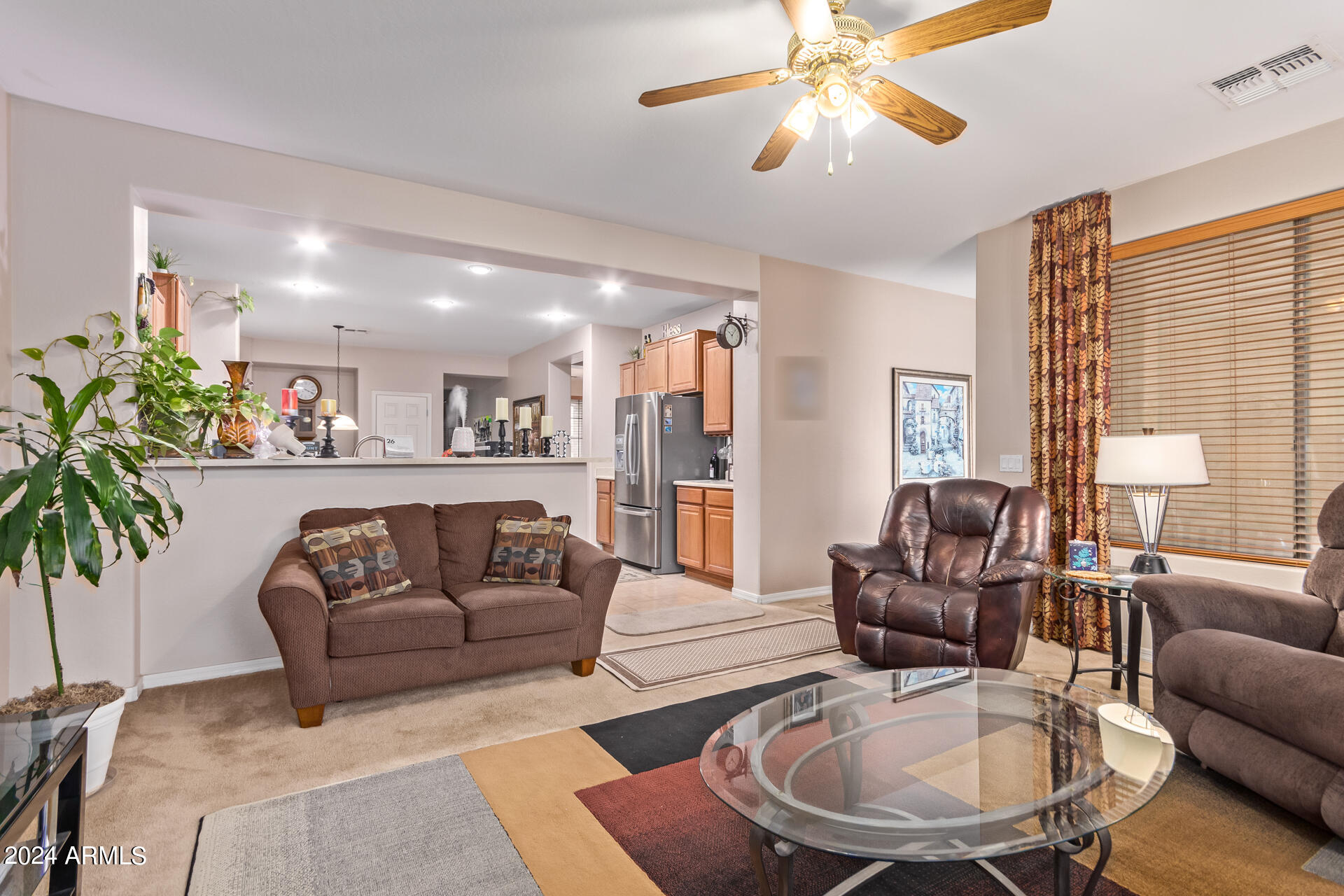 15224 West Redfield Road Surprise, AZ 85379 - Photo 10 of 28 a living room with furniture and a large window