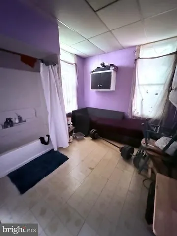 a bathroom with a sink a toilet and bathtub