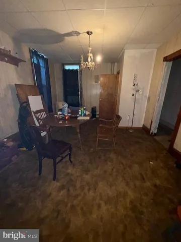 a view of livingroom with furniture and a flat screen tv