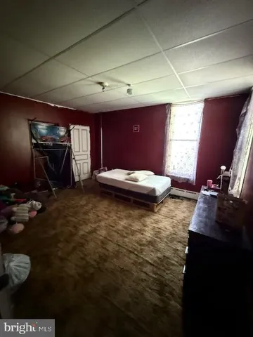 a view of room with furniture