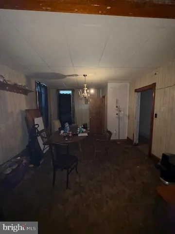 a room with furniture and gym equipment