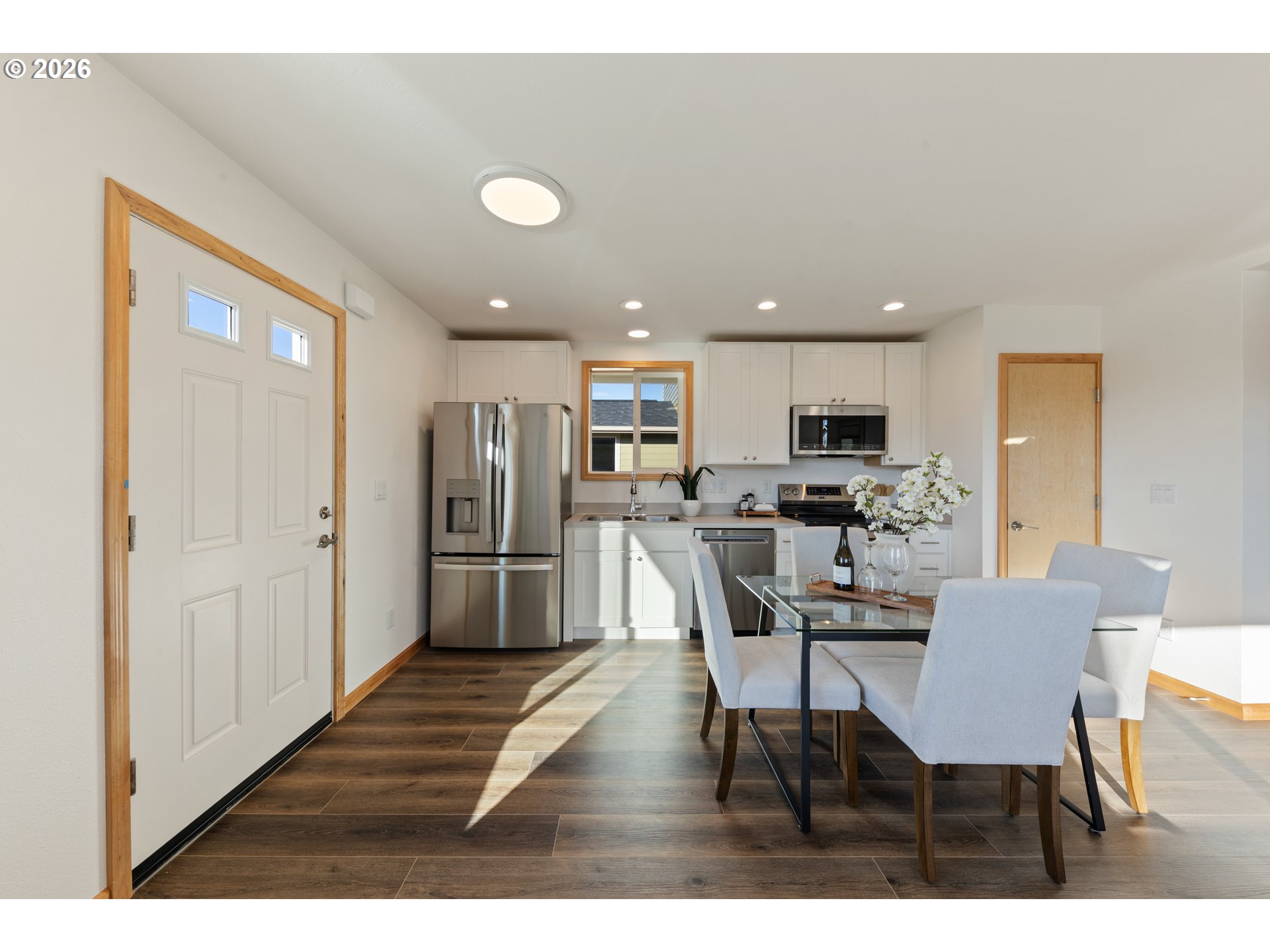 749 ST Charles Street Eugene, OR 97402 - Photo 30 of 37 a view of kitchen with refrigerator stove dining table and chairs