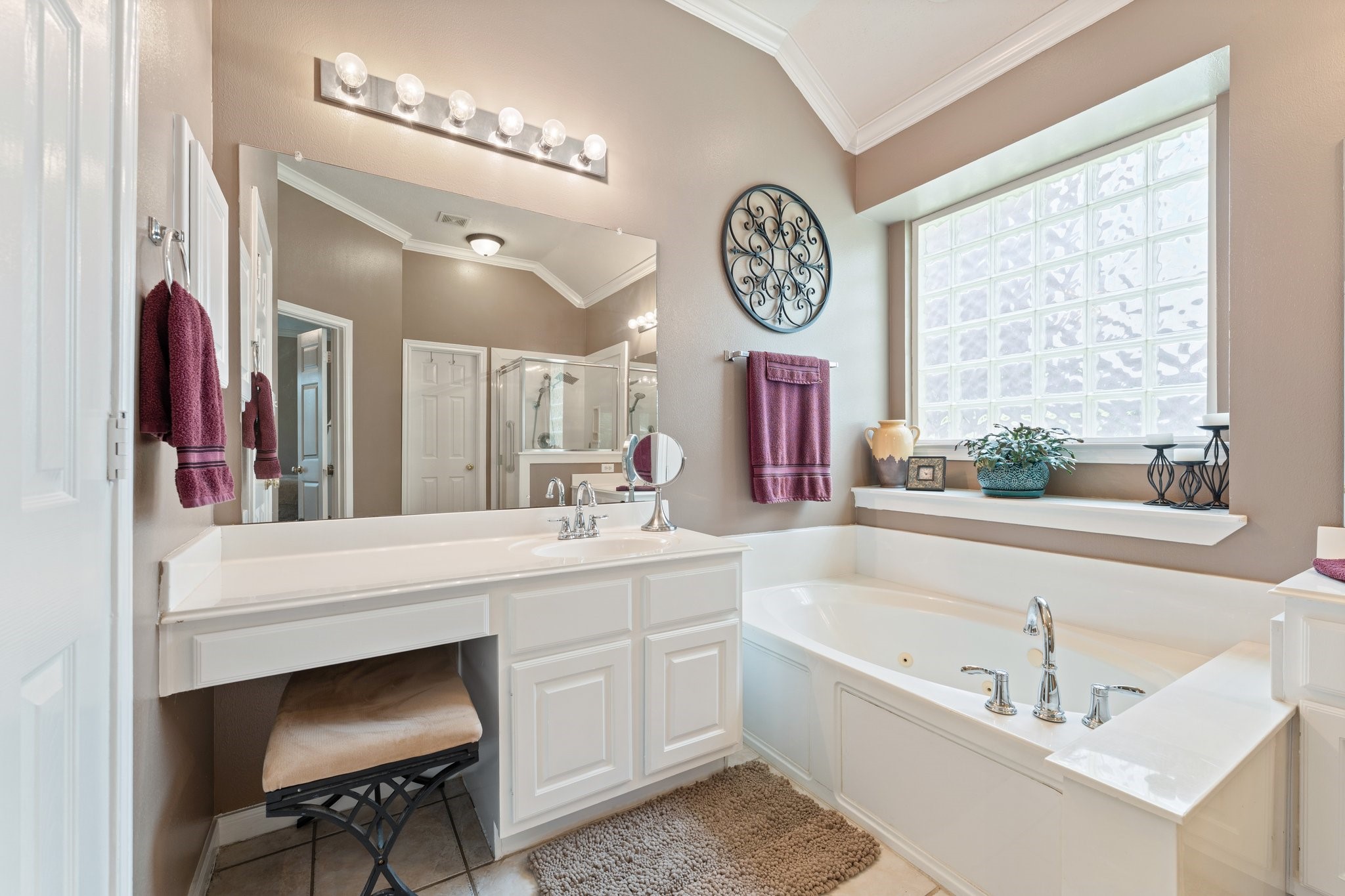 25447 China Springs Spring, TX 77373 - Photo 23 of 45 A bright primary bathroom featuring a dedicated vanity area, giving you space to start and end each day comfortably.