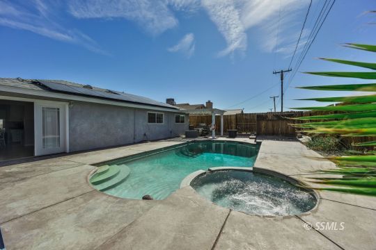 1341 Sims Street Ridgecrest, CA 93555 - Photo 24 of 27 a view of a backyard with seating space