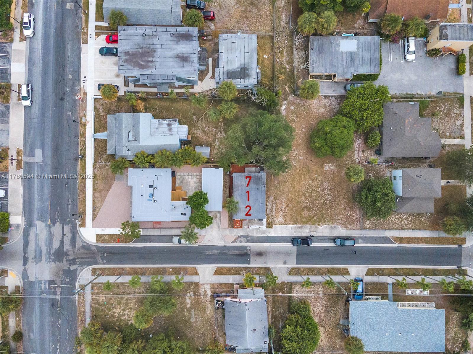 712 Division Avenue West Palm Beach, FL 33401 - Photo 13 of 37 an aerial view of houses with outdoor space