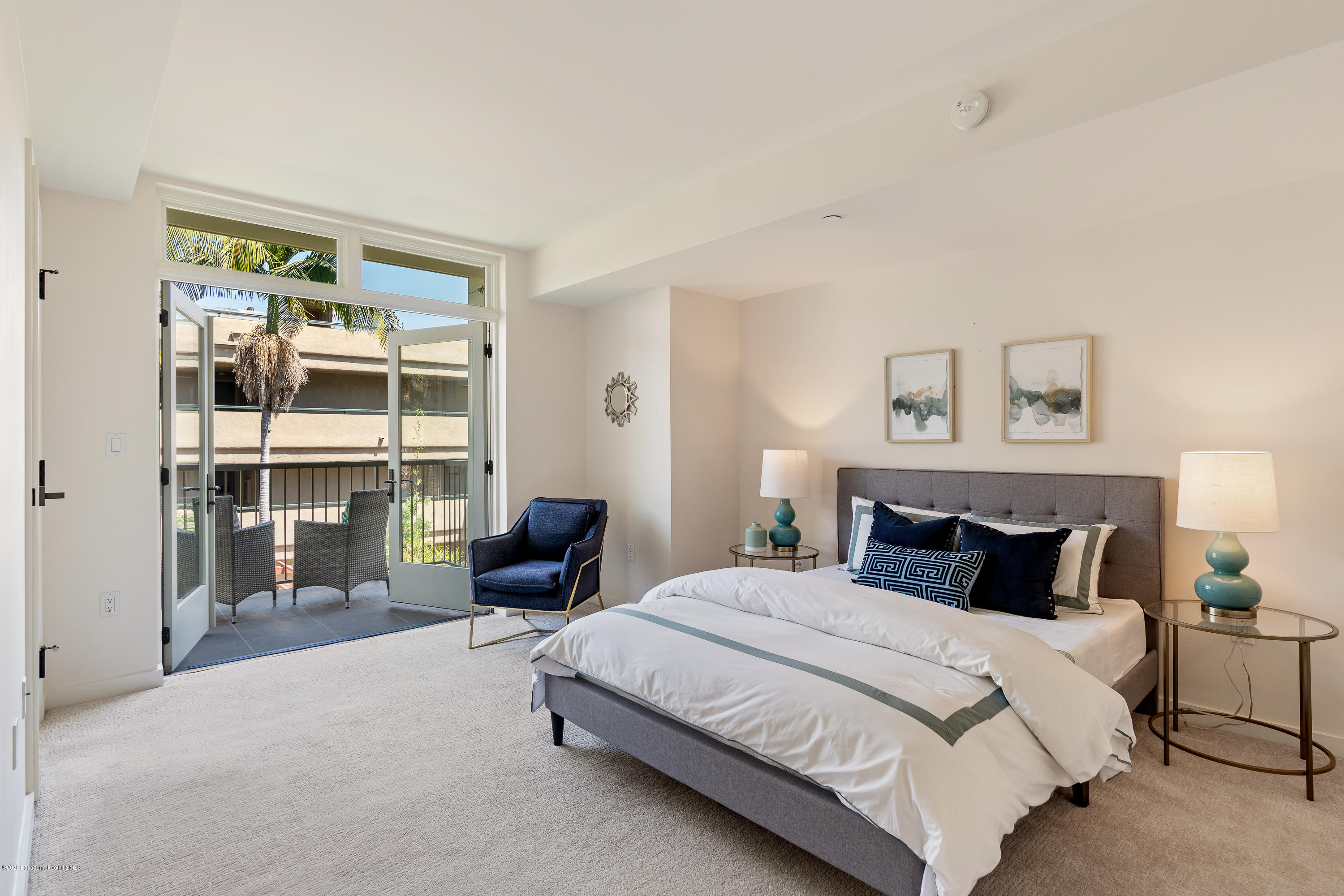 920 Granite Drive, Unit 309 Pasadena, CA 91101 - Photo 18 of 40 a bedroom with a bed and a window