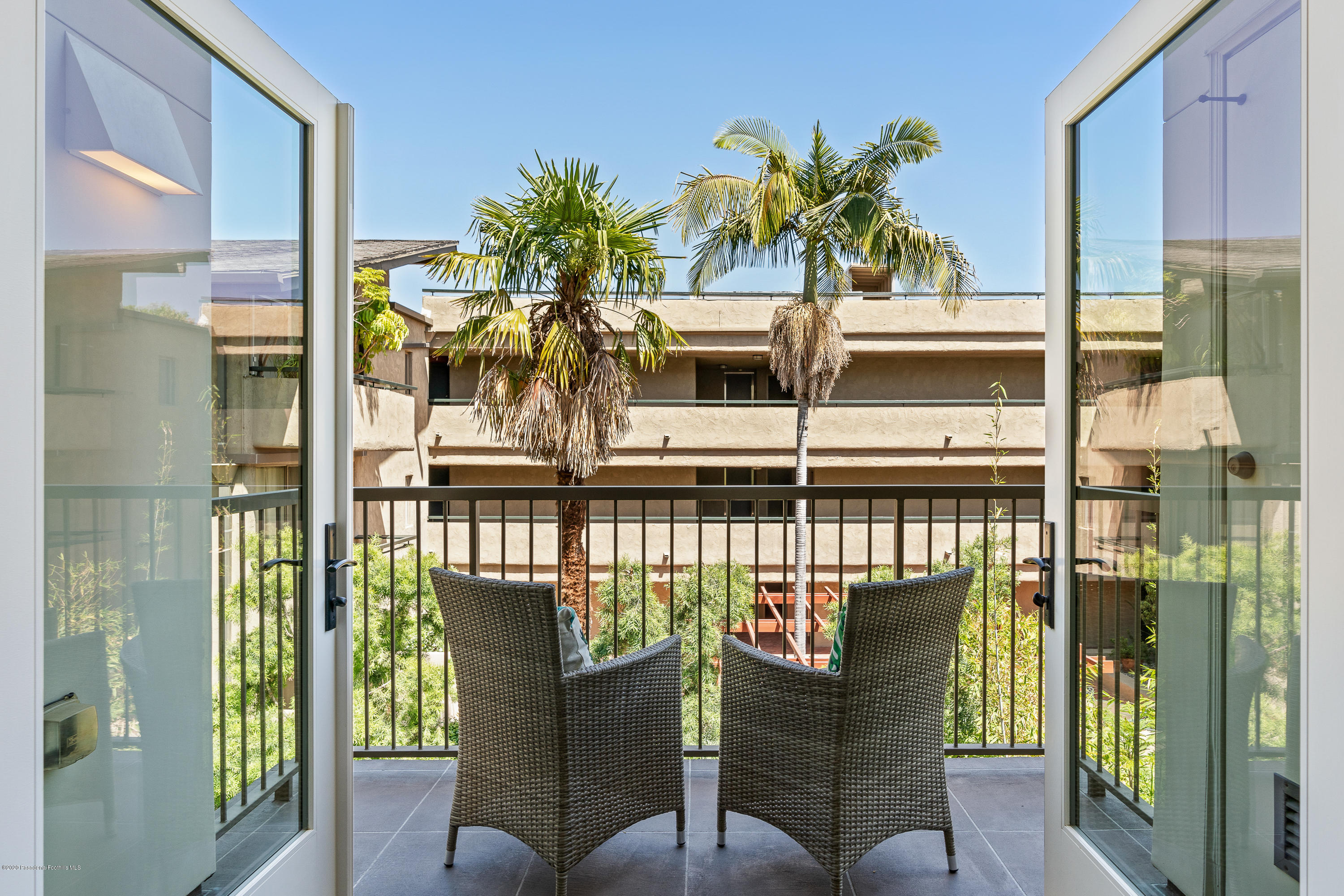 920 Granite Drive, Unit 309 Pasadena, CA 91101 - Photo 19 of 40 a view of a balcony with chairs