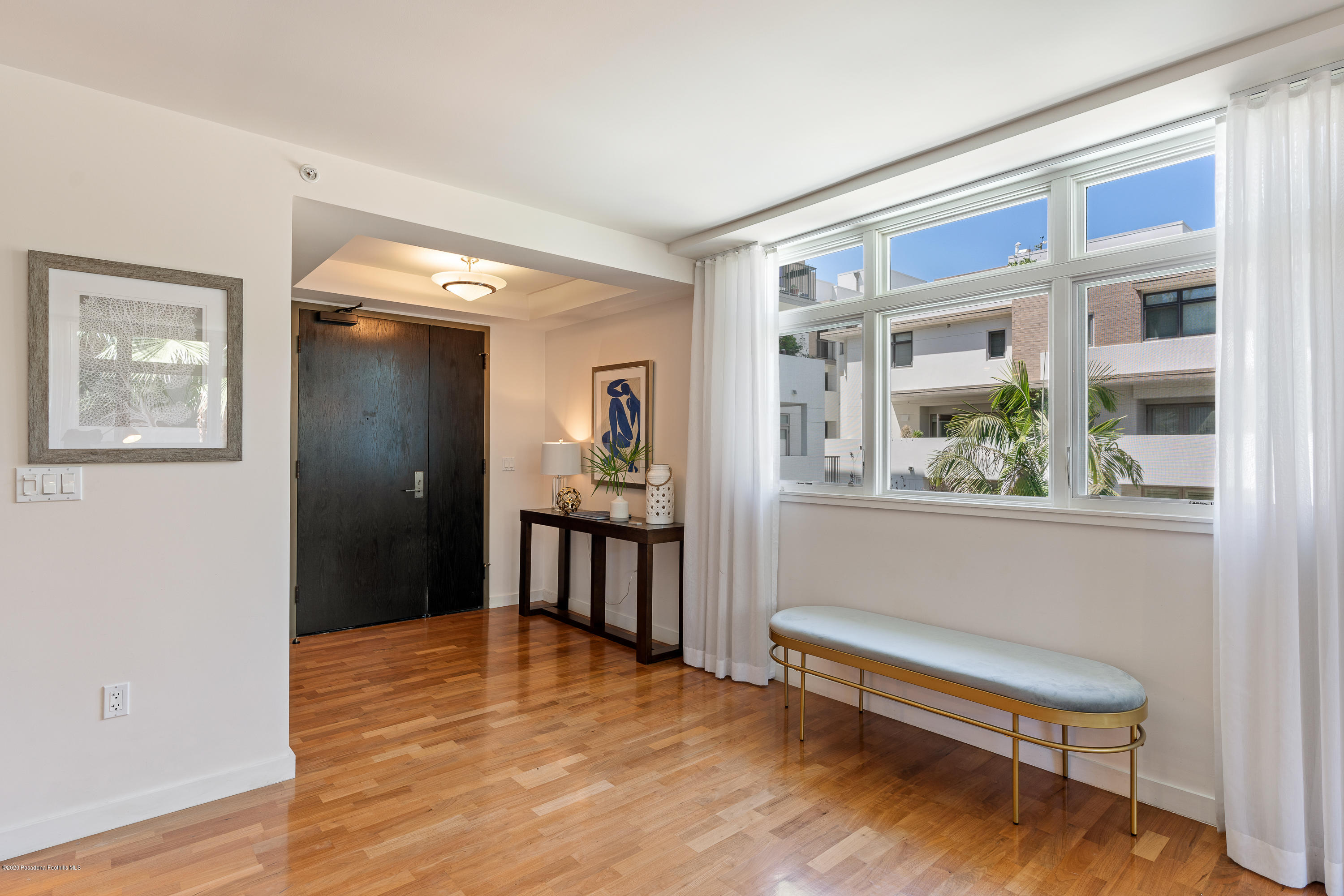 920 Granite Drive, Unit 309 Pasadena, CA 91101 - Photo 2 of 40 a view of livingroom with furniture and windows