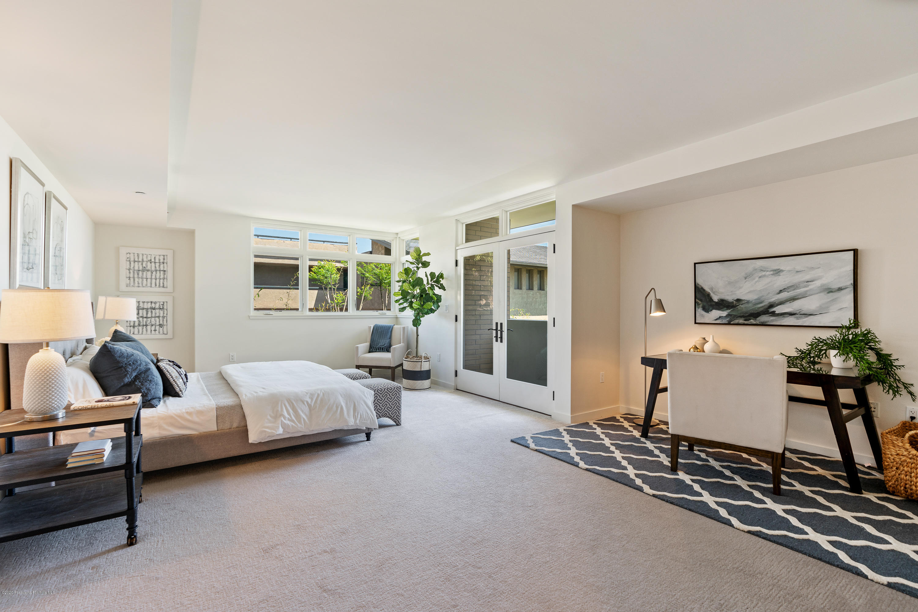 920 Granite Drive, Unit 309 Pasadena, CA 91101 - Photo 21 of 40 a bed room with furniture and a window