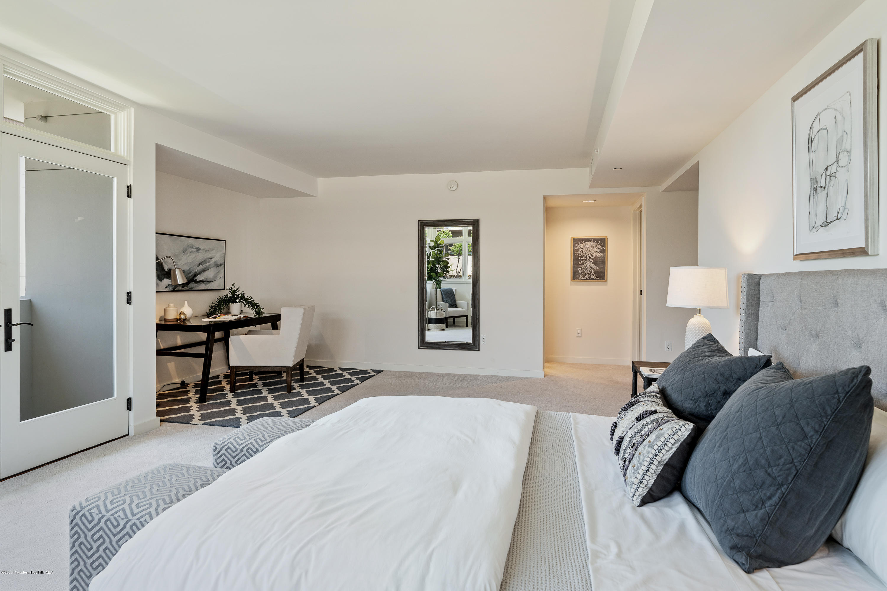 920 Granite Drive, Unit 309 Pasadena, CA 91101 - Photo 23 of 40 a bedroom with a bed and a window