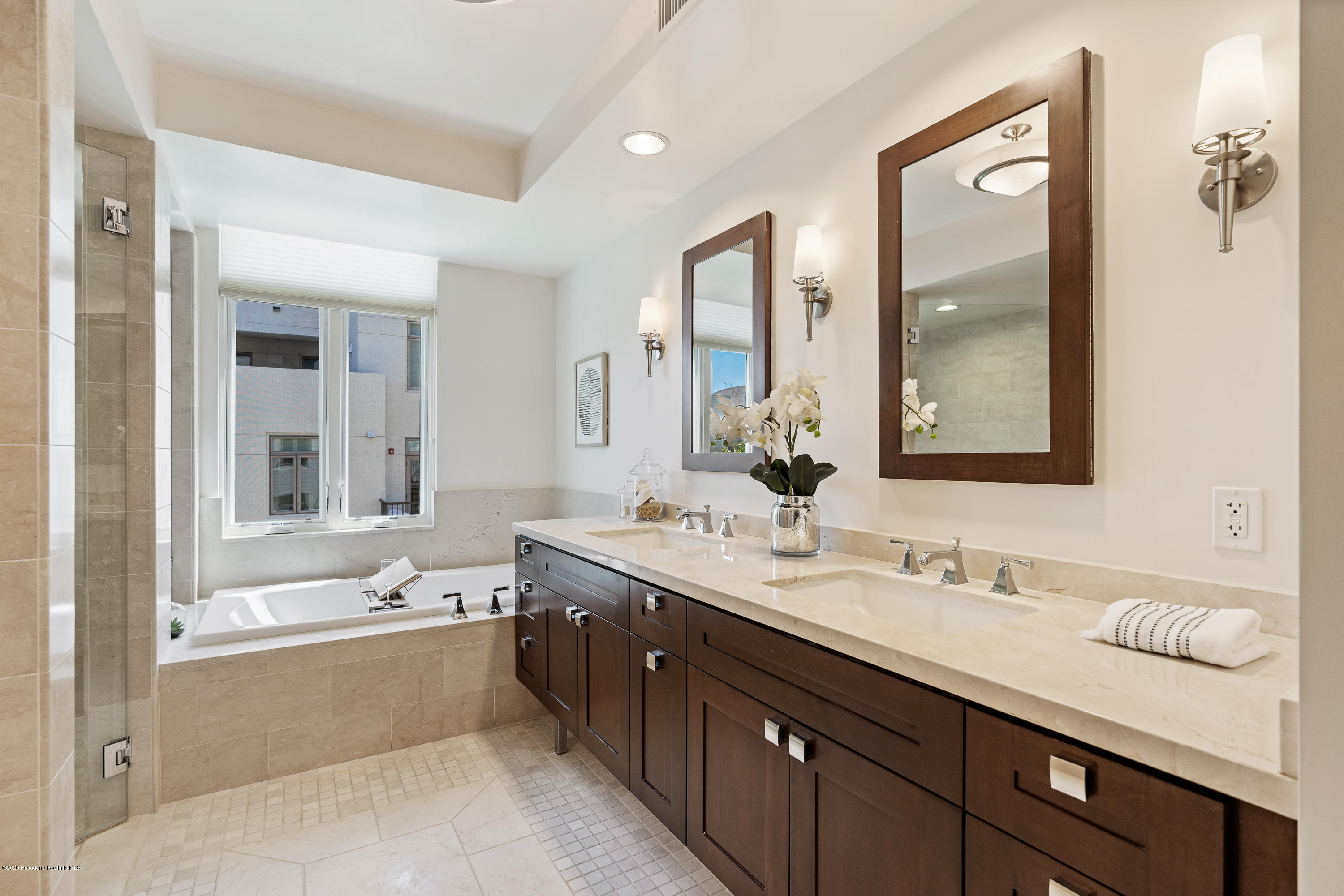 920 Granite Drive, Unit 309 Pasadena, CA 91101 - Photo 24 of 40 a bathroom with a tub double sink window and mirror