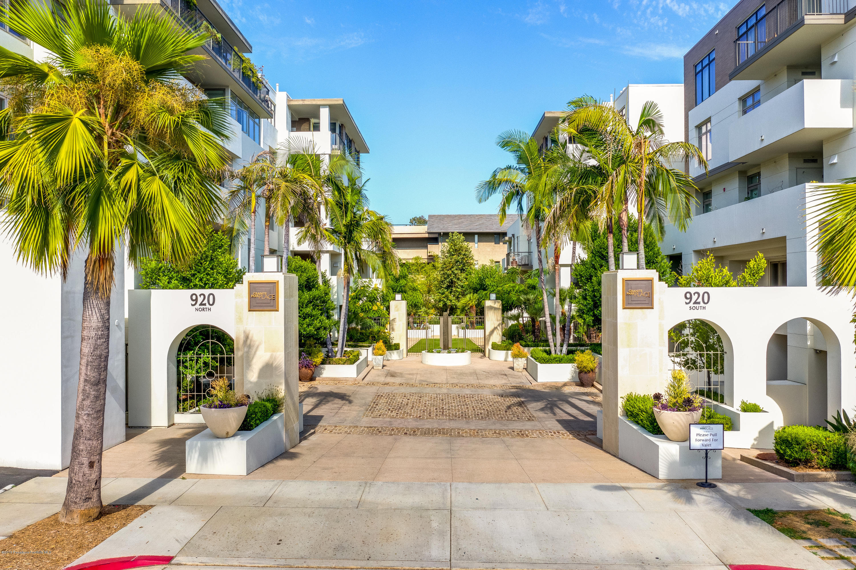 920 Granite Drive, Unit 309 Pasadena, CA 91101 - Photo 26 of 40 a view of a patio with couches and a potted plant