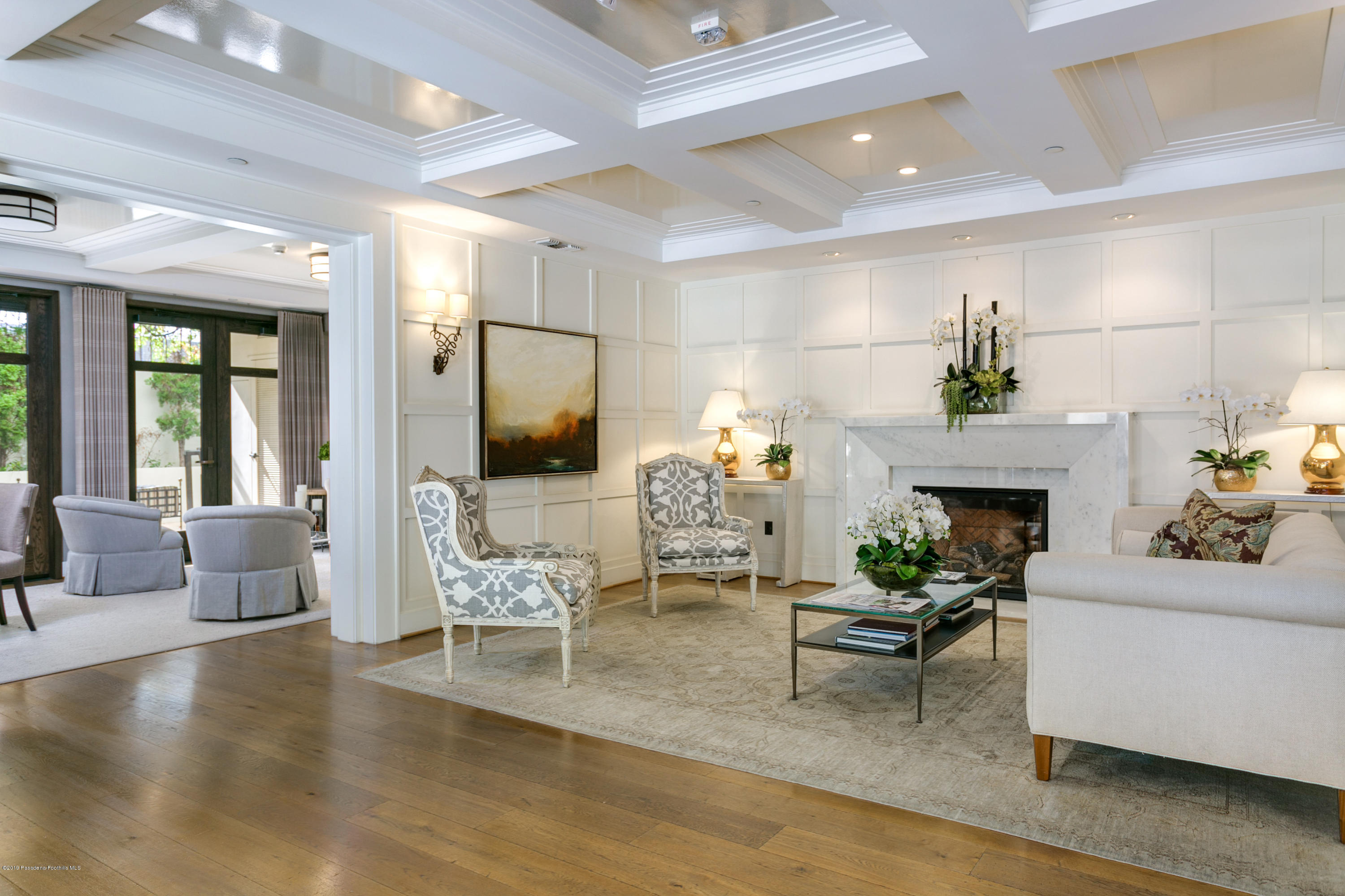920 Granite Drive, Unit 309 Pasadena, CA 91101 - Photo 28 of 40 a living room with furniture a fireplace and a potted plant