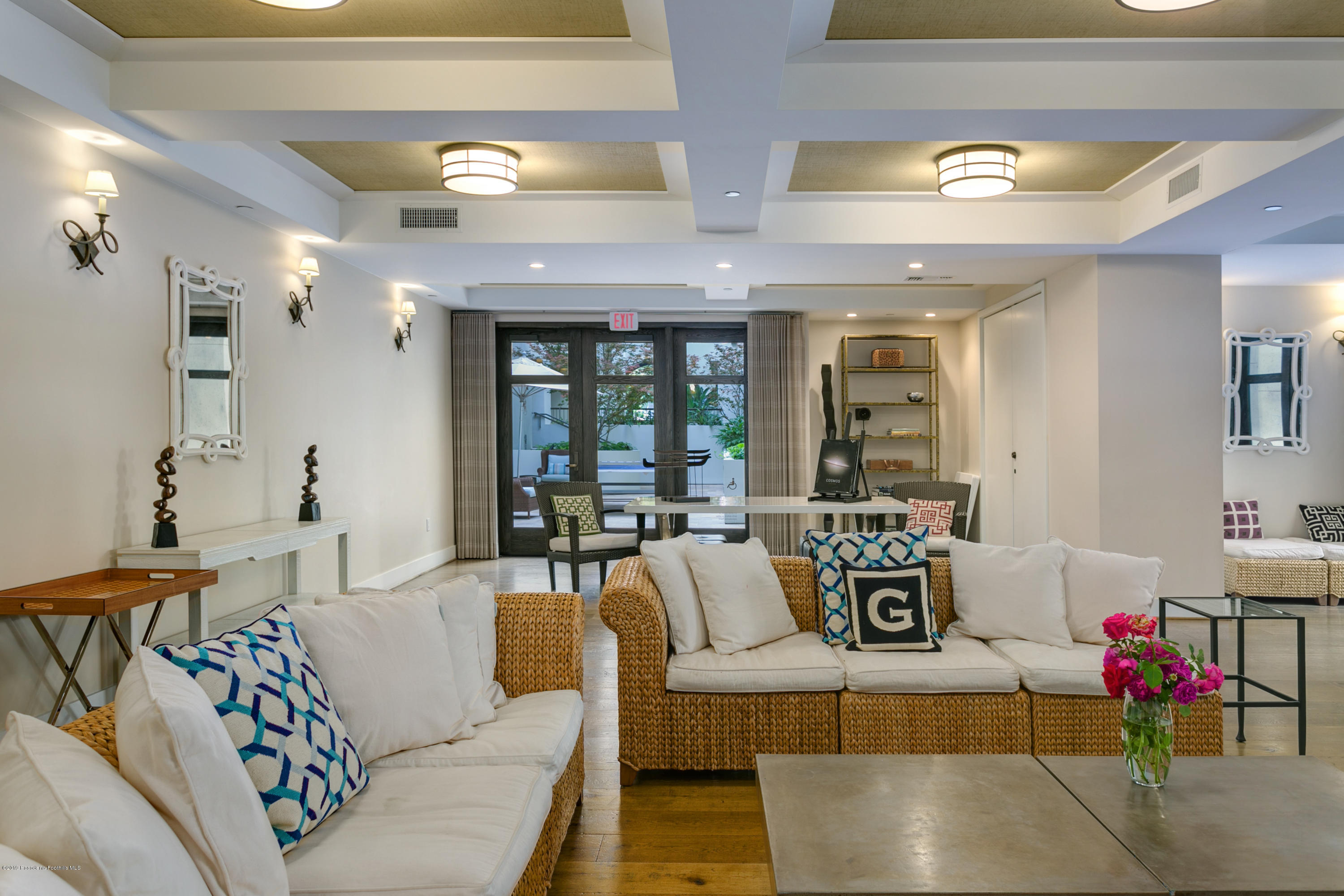 920 Granite Drive, Unit 309 Pasadena, CA 91101 - Photo 31 of 40 a living room with furniture and a chandelier