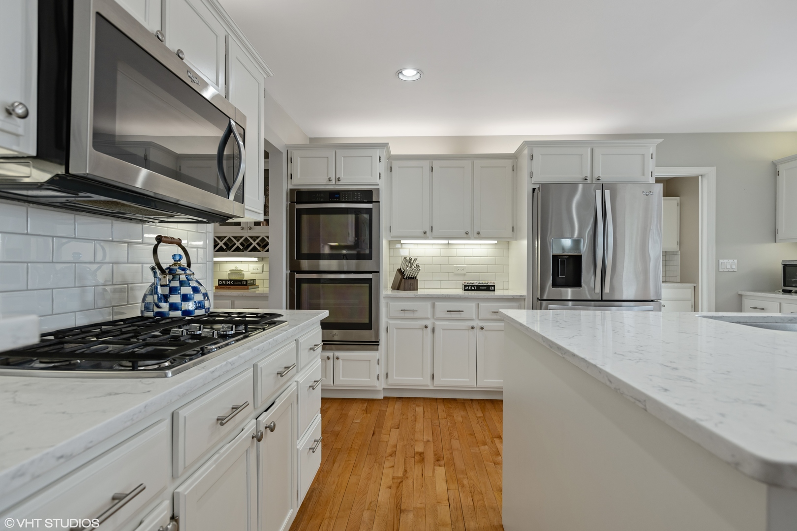 1909 Cornell Drive New Lenox, IL 60451 - Photo 7 of 26 a kitchen with stainless steel appliances a sink stove and refrigerator